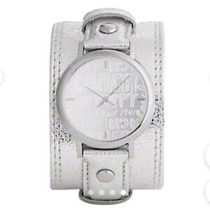Coach Poppy cuff watch. Genuine leather with silver metallic‎ design. Vintage